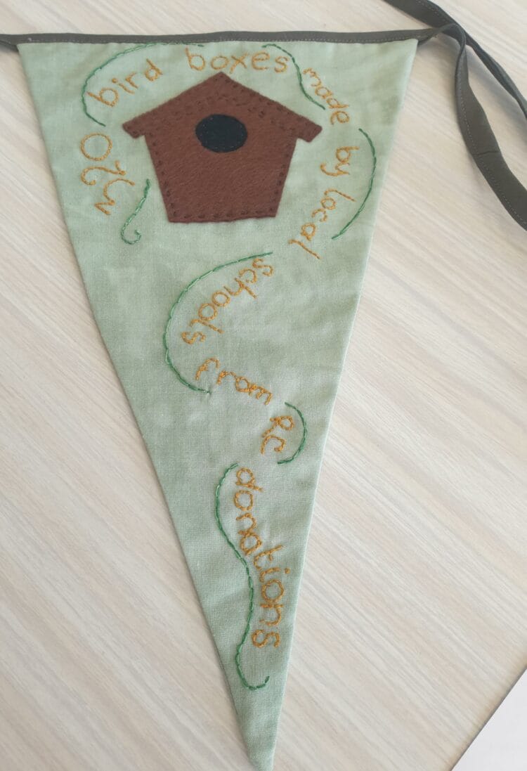 Lambs Lane Repair Cafe's bunting flag will be displayed in The Hague at an international celebration of 15 years of fixing. Picture: Billie Bachra