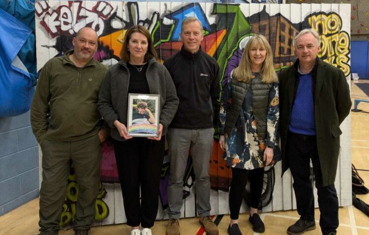 Stuart and Amanda Stephens, with a picture of Olly, alongside Matt Rodda MP, Cllr Karen Rowland, and community safety manager Jason Murphy.