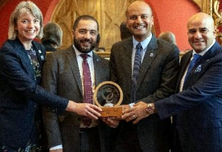 The Bexprt management team with their King?s Award for Enterprise for International Trade. Left to right, CMO Gwen Edwards, CTO Mahmoud El Zayet, director of telecom services, Ahmad Okasha, and founder & CEO Mohamed Hamdy. Pic: Charlotte Carter.