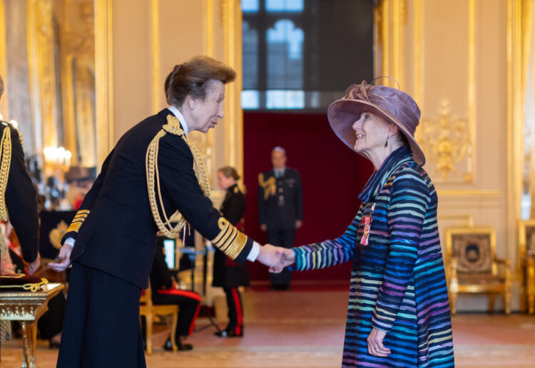 Professor Rhona Stainthorp, of the University of Reading?s Institute of Education, was officially appointed Officer of the Order of the British Empire, and is pictured receiving the honour from HRH Princess Anne.