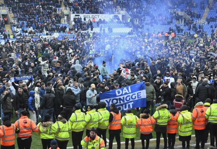 Reading FC fans protested on the pitch last season Picture: Luke Adams