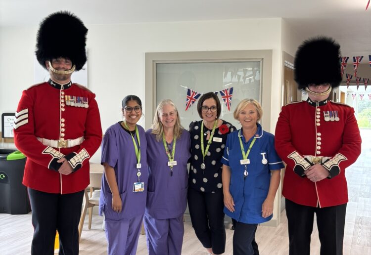 Thames Hospice has commemorated the 80th anniversary of VE Day with a visit from the Welsh Guards and has announced it has received an employer recognition accolade. Picture: Thames Hospice
