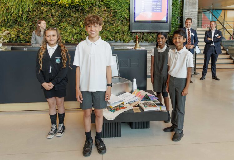 Station Hill has marked its official opening with a ceremony and the burial of a time capsule featuring architect sketches and memorabilia from students from Civitas Academy (pictured). Picture: Dave Olinski