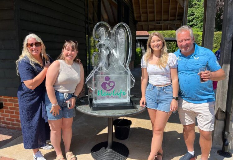 New Life, which raises money to fund equipment for NHS hospitals and their special care baby units, is celebrating its 30th year. Picture: Trevor Goodall with daughters Hannah and Isabel plus former wife Tanya.