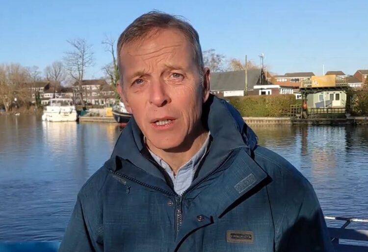 Matt Rodda, the Labour MP for Reading East, at the bank of the River Thames calling for people to inform him about flooding issues they have faced. Credit: Matt Rodda