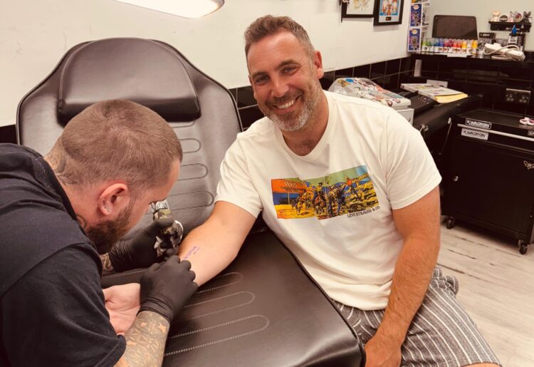 Matt Parting, headteacher of St Mary & All Saints, Reading, has a new tattoo, thanks to his school's success. Picture: St Mary & All Saints