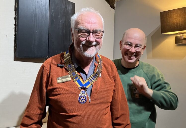 James Richardson photographs a moment of hilarity, typical of the club, after Marius had formally presented Brian with his chain of office. Picture: Pangbourne Rotary