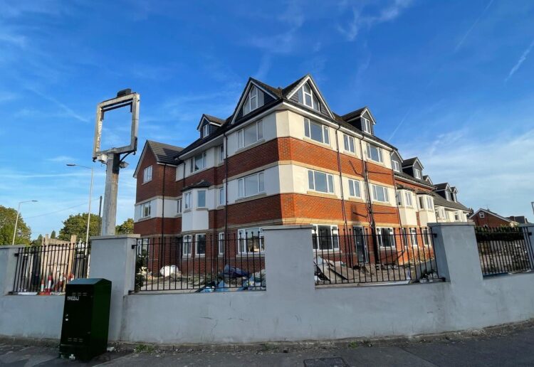 The apartment block that replaced the Eastern Pearl and Four Horseshoes pub at the junction of Basingstoke Road and Long Barn Lane in Whitley. Credit: James Aldridge, Local Democracy Reporting Service