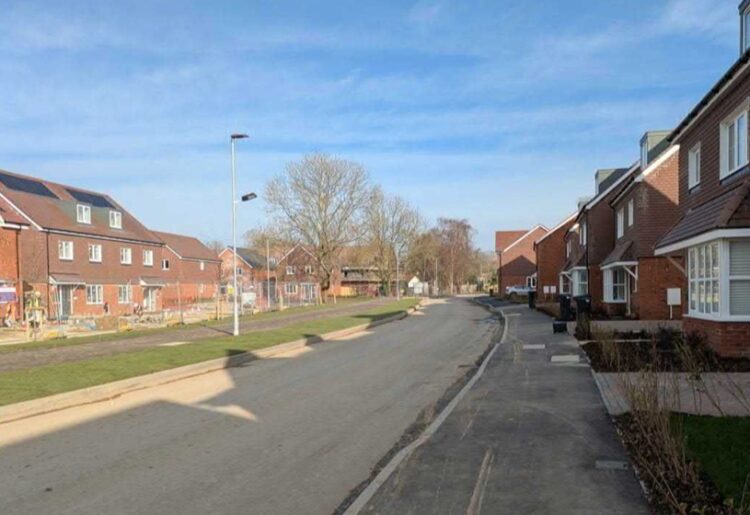 A view of new homes along The Fairway, the main road of the Emmer Green Drive development of 223 homes off Kidmore End Road, Caversham. Credit: SPD