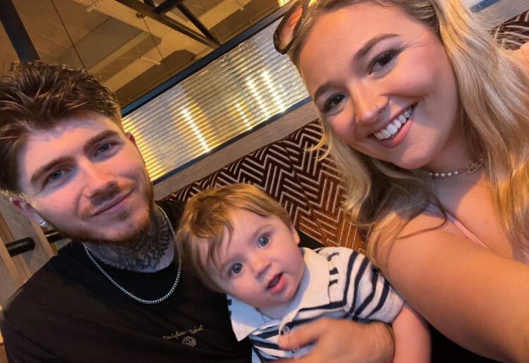 Livvy Cook and Shamen Goswell with their son, who is 11 months old. Livvy and her son live in Frensham Green, Shinfield, which is managed by Wokingham Borough Council. Credit: Livvy Cook