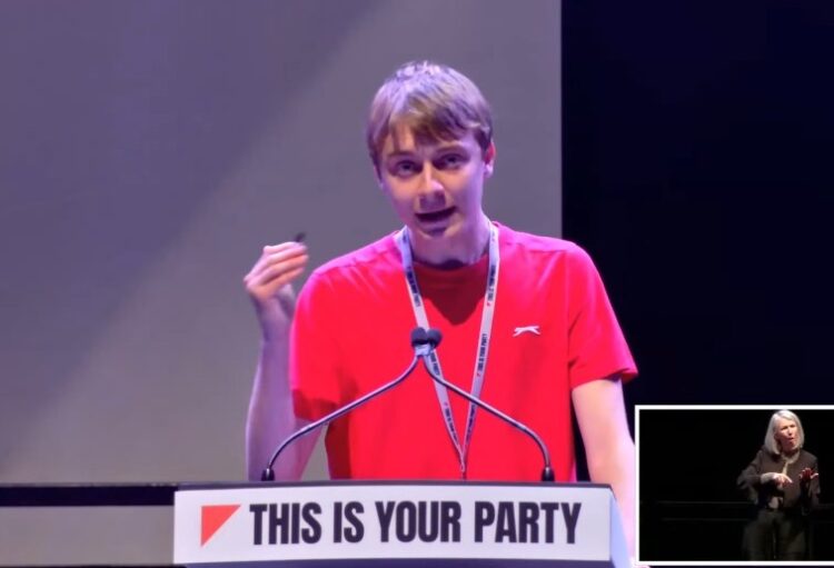 Adam Gillman speaking during Day One of the Your Party conference in Liverpool on Saturday, November 29. Credit: Your Party YouTube