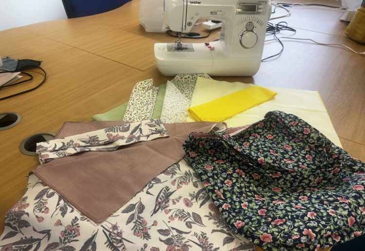 Adult learners from Activate Learning have created tote bags for grieving friends and families to take home their loved one's belongings from hospital. Picture: Activate Learning