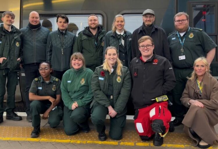A passenger who suffered a cardiac arrest on board a train has met with rail staff who helped saved his life.