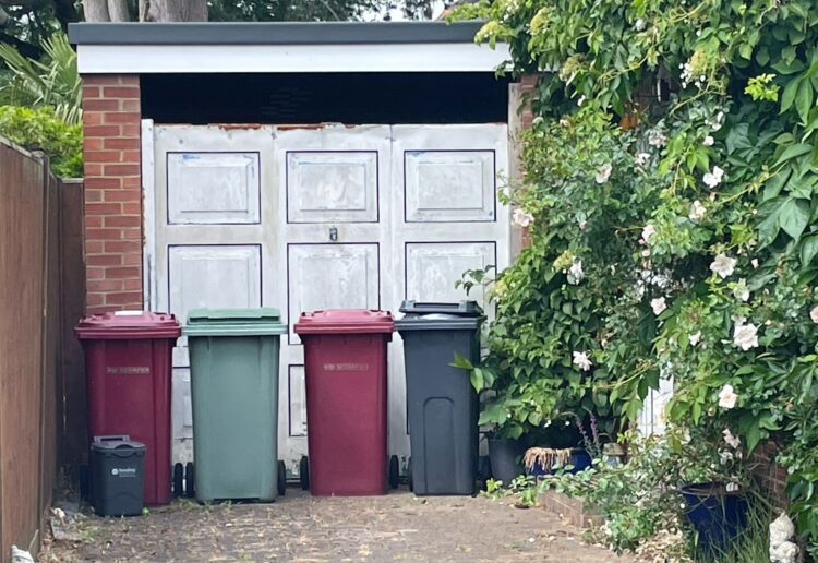 A row of bins, including a green waste bin, at a home in Reading. Credit: James Aldridge, Local Democracy Reporting Service