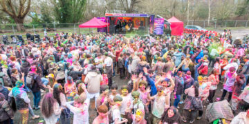 PICTURE GALLERY: Reading painted in rainbow hues as thousands join Holi Milan Festival