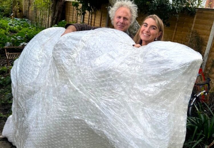 Charlie Mackesy (here with Dr Rachael de Caux) will design and hand-paint one of Thames Hospice's Trunks across the Thames elephant sculptures. Picture: Thames Hospice