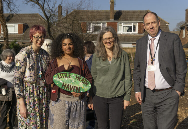 Former student and project designer Bethany King cutting the ribbon at the unveiling event. Picture: Little Heath School