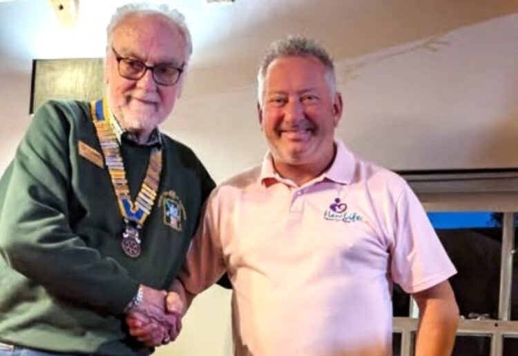Trevor Goodall was welcomed into Pangbourne Rotary Club by president Brian Davies. Picture: Pangbourne Rotary Club