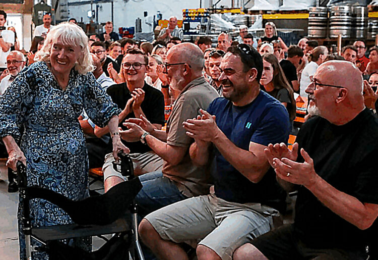Margaret Wrigley steps up to accept her award at the 2025 TradeMark Berkshire Football Awards. Photo: Darren Woolley.