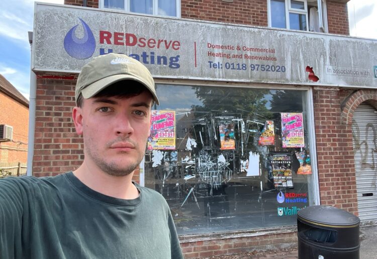 Councillor Will Cross (Labour, Redlands) outside the former RedServe Heating building at 56 Christchurch Road, Reading, which has been vacant since the mid-2000s. Credit: Reading Labour