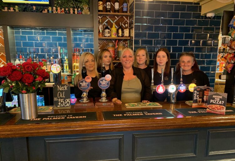 Samantha Lane, centre, with her team at The Palmer Tavern in Wokingham Road, East Reading. Credit: Samantha Lane Nest Pubs Franchise by Greene King