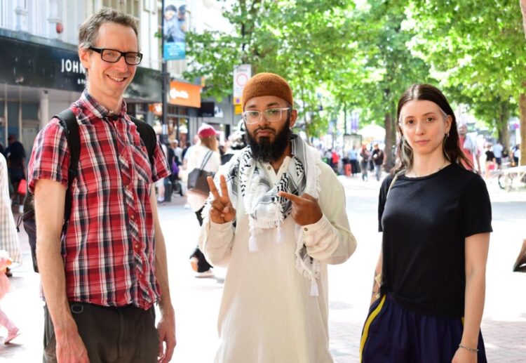 Jubair Khan (centre), with Rob White, the leader of the Reading Green Party and representative for Park ward, and councillor Jacqueline Dominguez (Green, Abbey). Credit: Reading Green Party