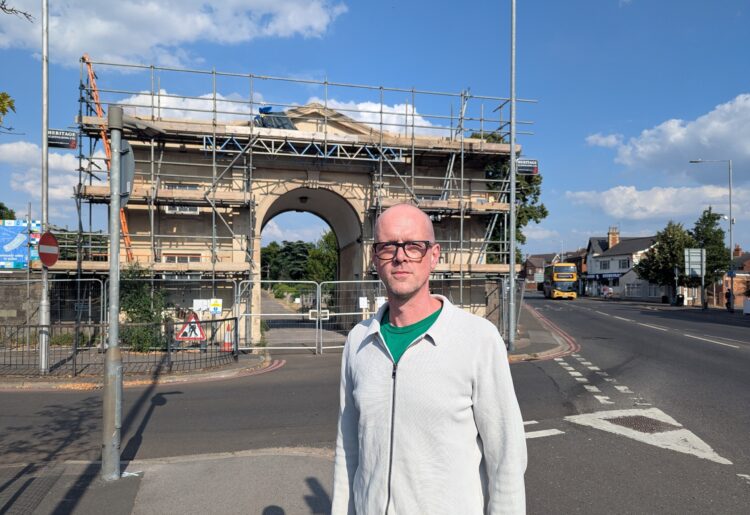 Councillor Josh Williams (Green, Park) at the Cemetery Junction Arch in East Reading. Credit: Reading Green Party